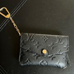 Louis Vuitton Black monogram key pouch/wallet. Good condition, minor scratches